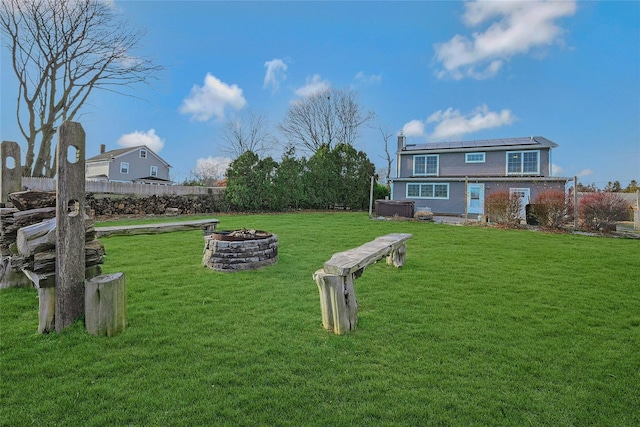 view of yard featuring a fire pit