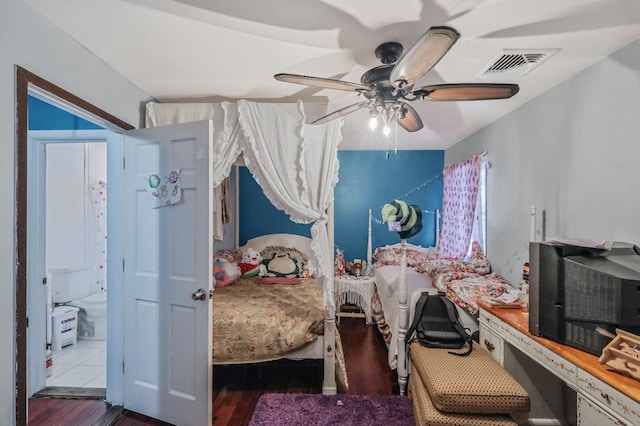 bedroom featuring hardwood / wood-style flooring and ceiling fan