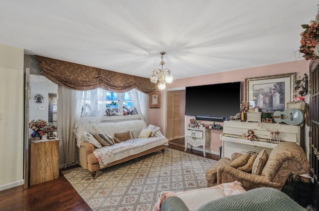 bedroom featuring a chandelier and light hardwood / wood-style floors