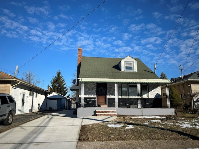 view of front of house with a garage and a porch