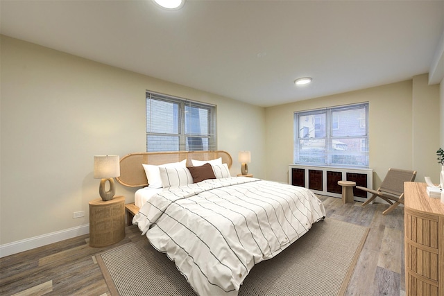 bedroom featuring hardwood / wood-style flooring