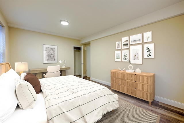 bedroom with wood-type flooring