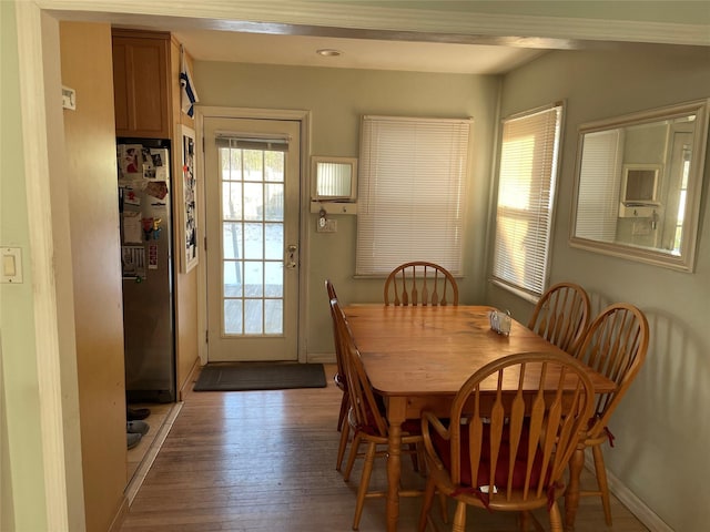 dining room featuring light hardwood / wood-style flooring