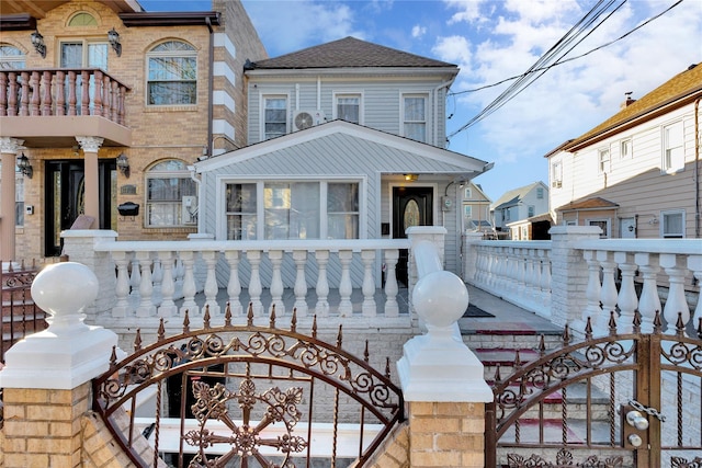 view of front facade with a balcony