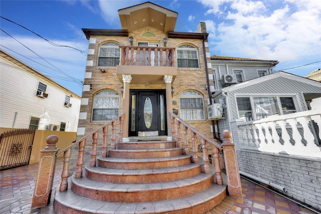 exterior space featuring a balcony