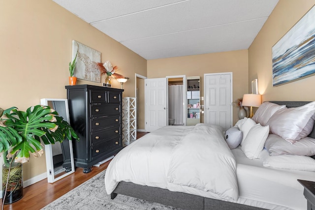 bedroom featuring dark hardwood / wood-style floors