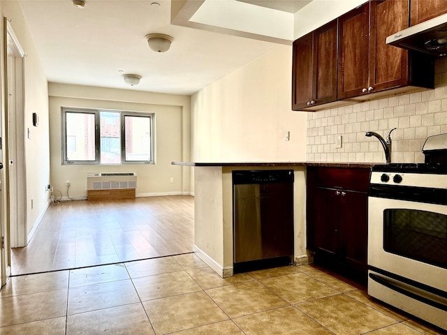 kitchen with dishwasher, decorative backsplash, range, and light tile patterned floors