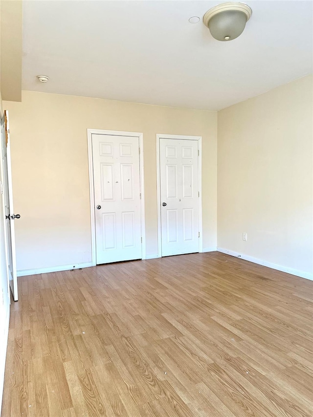 unfurnished bedroom featuring light hardwood / wood-style floors