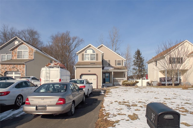 front of property with a garage