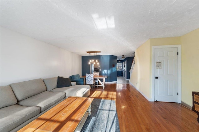 202 Essex Ct, Brewster, NY 10509 - living room with a textured ceiling and hardwood / wood-style flooring