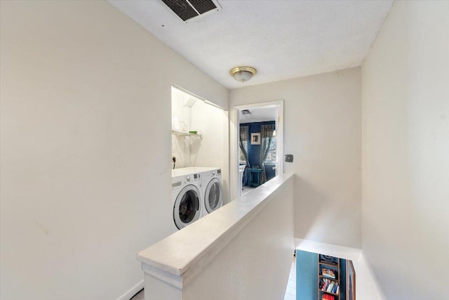 202 Essex Ct, Brewster, NY 10509 - clothes washing area featuring washer and dryer and a textured ceiling