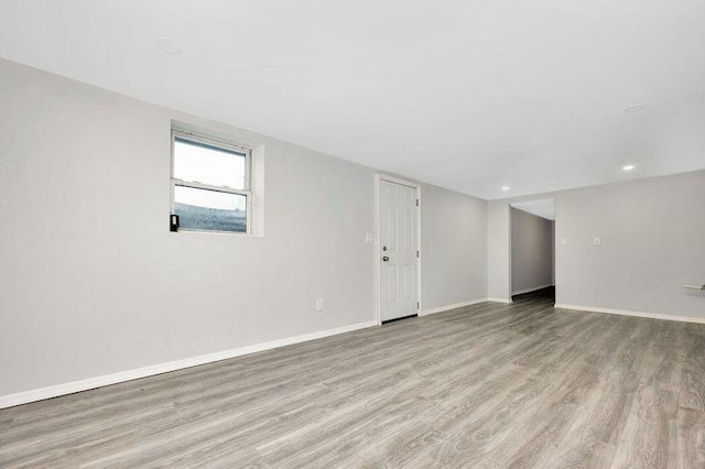 empty room with light wood-type flooring