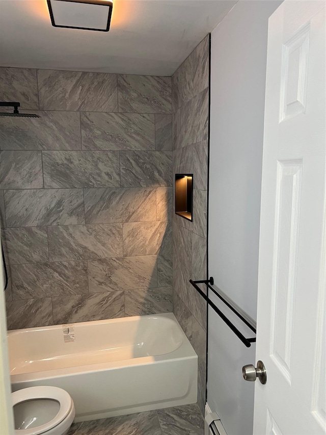 bathroom with shower / bath combination and toilet