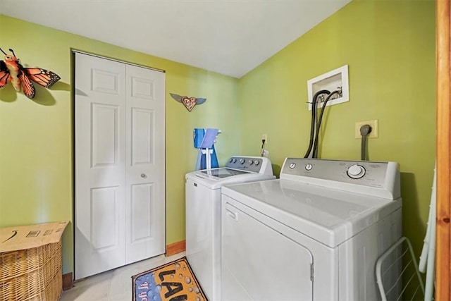 laundry room featuring separate washer and dryer