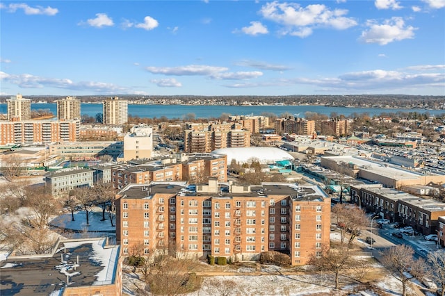 birds eye view of property featuring a water view