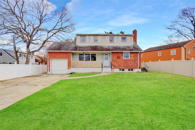 view of front facade with a garage and a front lawn