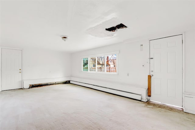 empty room with a baseboard radiator