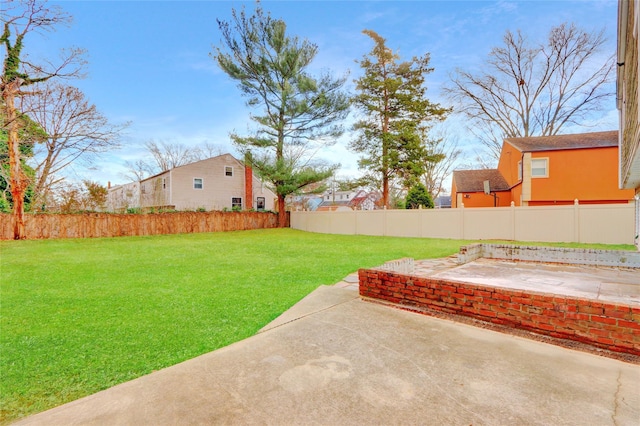 view of yard with a patio area