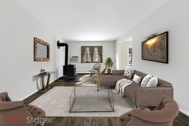 living room with a wood stove, a wall mounted AC, and dark wood-type flooring