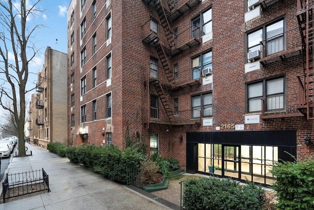 view of building exterior featuring cooling unit