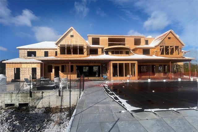 rear view of house featuring a patio area