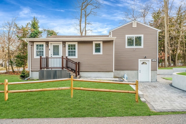 view of front of home with a front yard