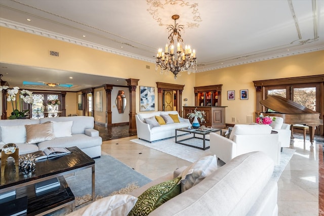 living room with a notable chandelier, light tile patterned flooring, and ornamental molding