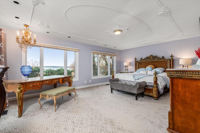 bedroom with light carpet and an inviting chandelier