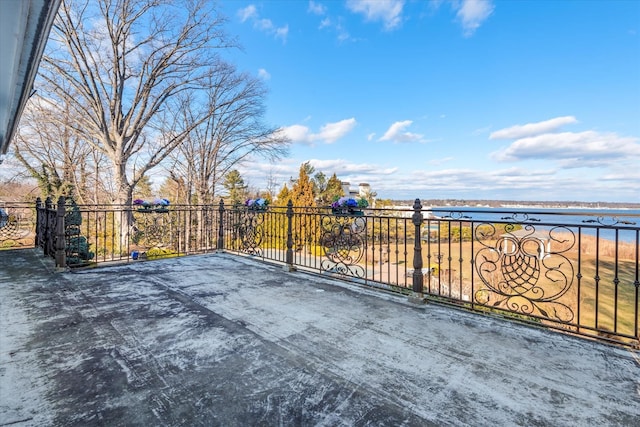 view of patio featuring a water view