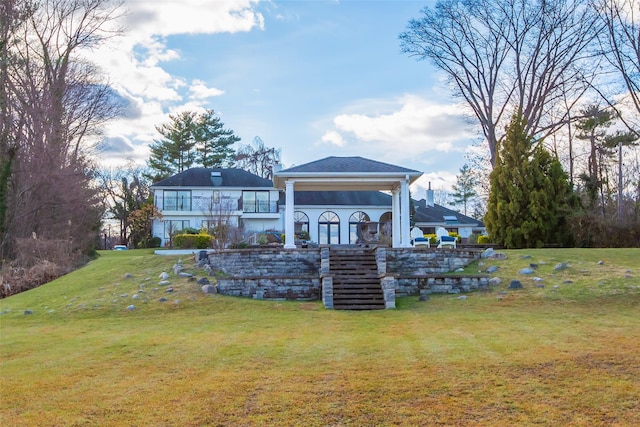 view of yard featuring a balcony