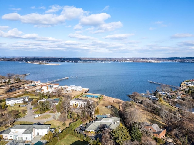 birds eye view of property featuring a water view