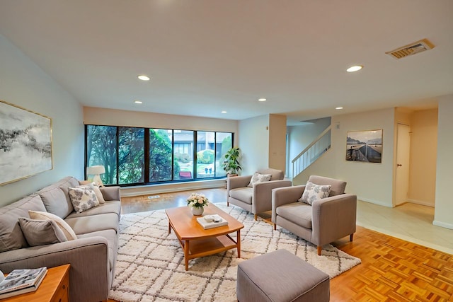 living room with light parquet floors