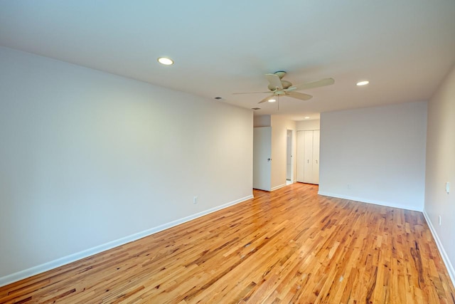 spare room featuring light wood-type flooring