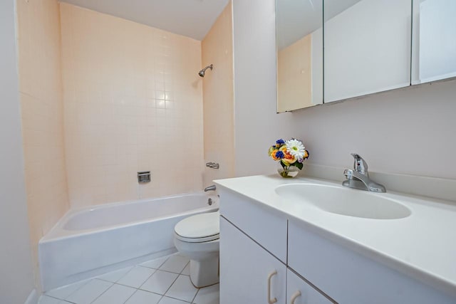 full bathroom with tile patterned flooring, vanity, toilet, and tiled shower / bath