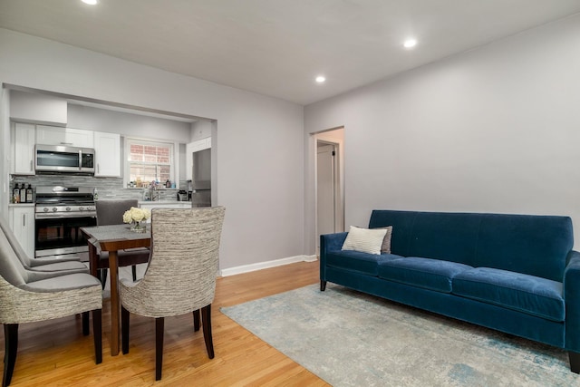 living room featuring light wood-type flooring