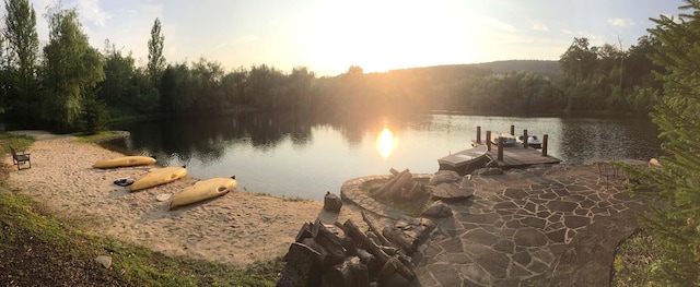 property view of water featuring a dock