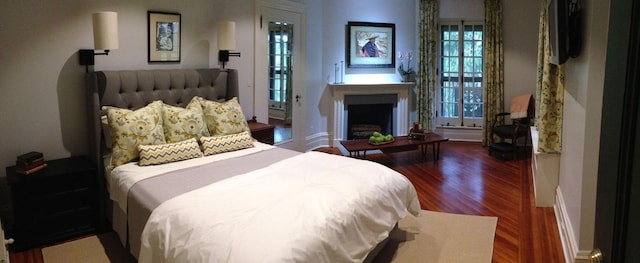 bedroom featuring dark wood-type flooring