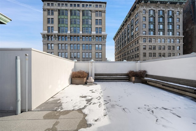 view of snow covered patio