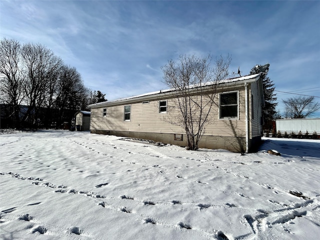 view of snow covered property