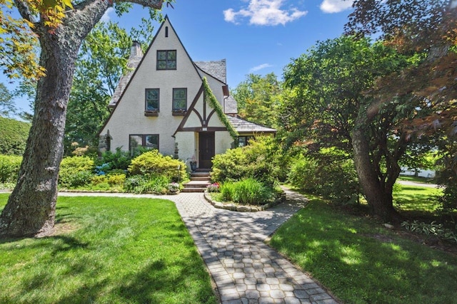 109 Argyll Ave, New Rochelle, NY 10804 - tudor house with a front lawn and stucco siding