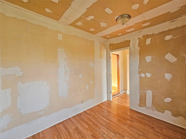 129-06 131st St, South Ozone Park, NY 11420 - spare room with wood finished floors