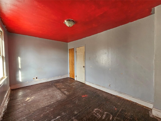 129-06 131st St, South Ozone Park, NY 11420 - unfurnished room featuring hardwood / wood-style floors and baseboards