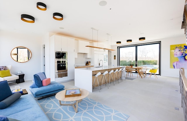 living room featuring sink