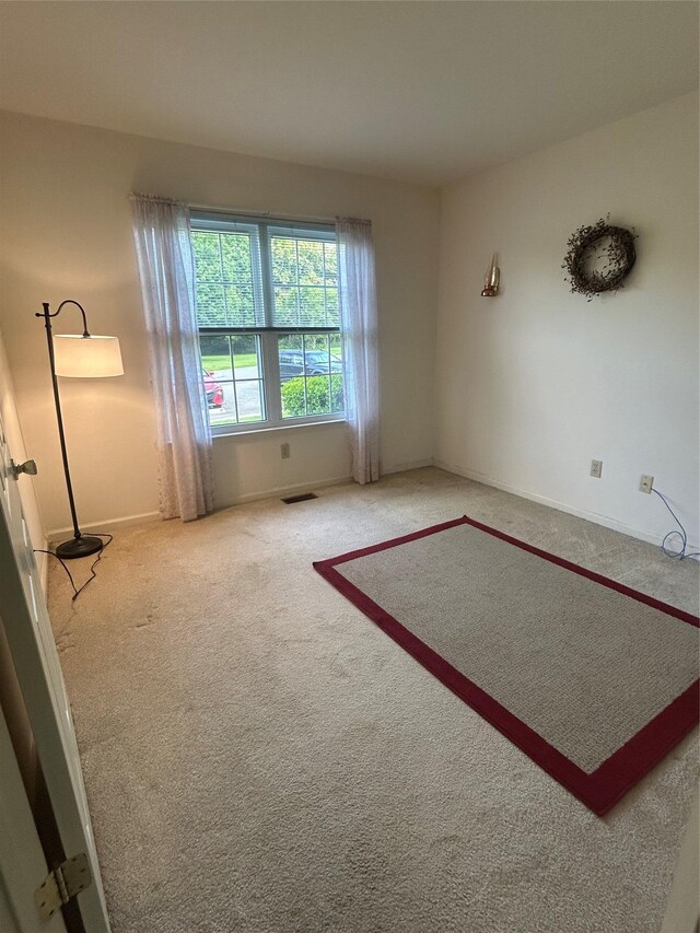 2555 Youngs Unit 7D, Southold, NY 11971 - empty room featuring carpet floors and baseboards