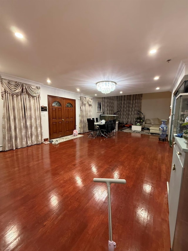 interior space featuring hardwood / wood-style flooring and an inviting chandelier