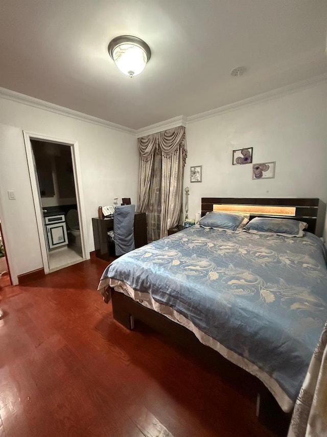 bedroom with dark wood-type flooring and ornamental molding