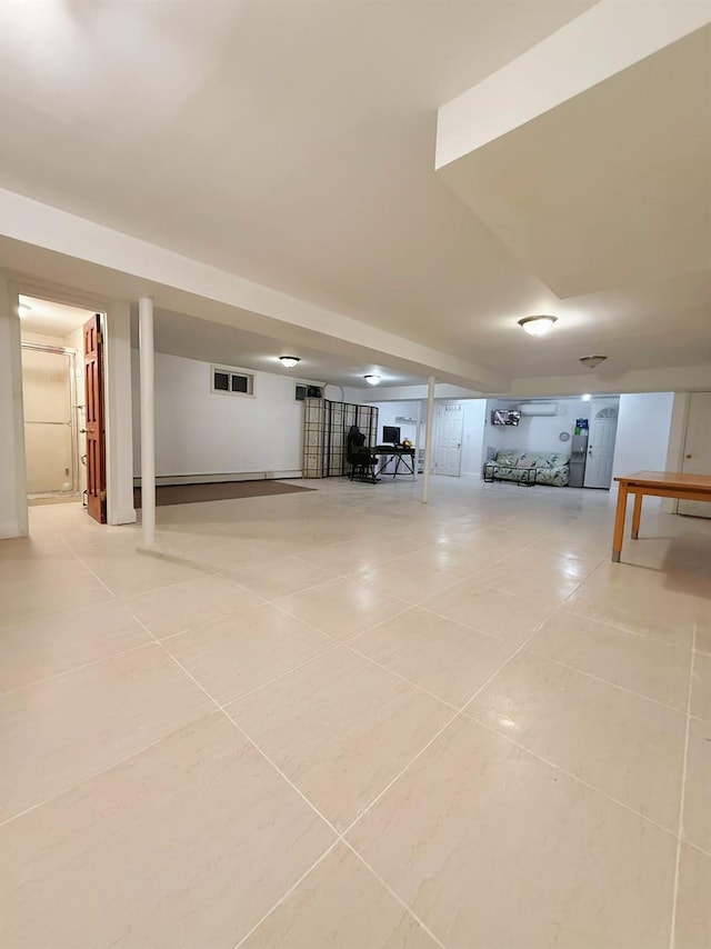 basement with tile patterned floors