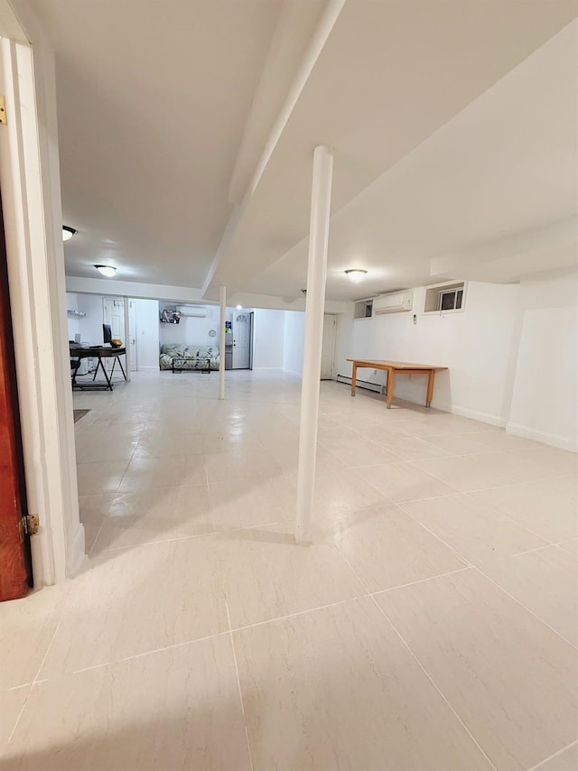 garage featuring a baseboard heating unit