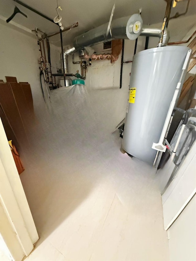 utility room with gas water heater