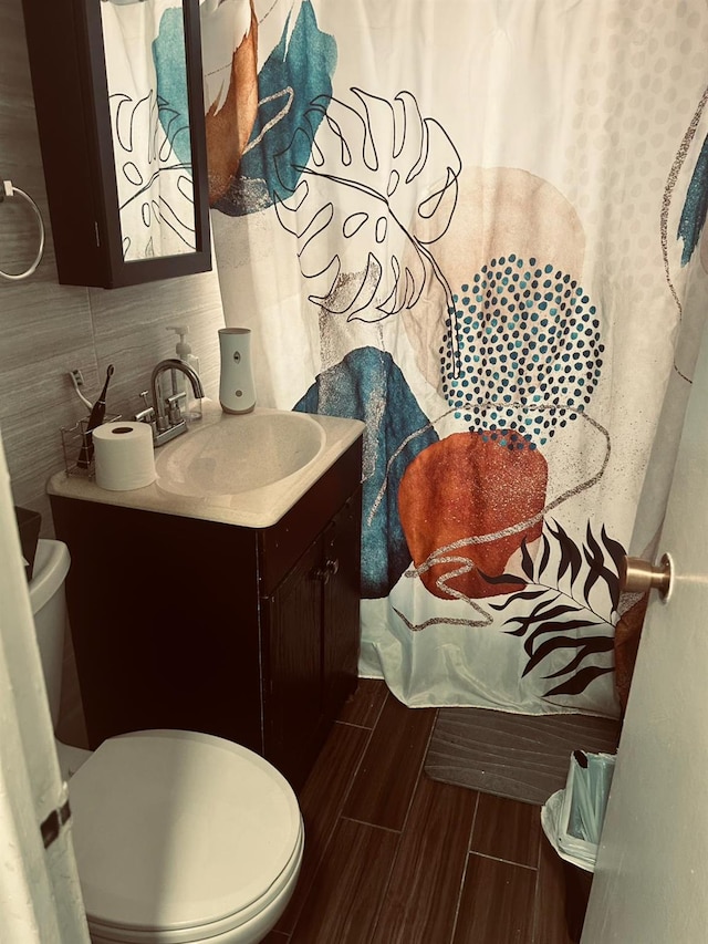 bathroom with vanity and toilet